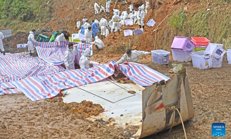 Rescuers conduct search and rescue work at the core site of the plane crash in Tengxian County, south China's Guangxi Zhuang Autonomous Region, March 25, 2022.Photo:Xinhua