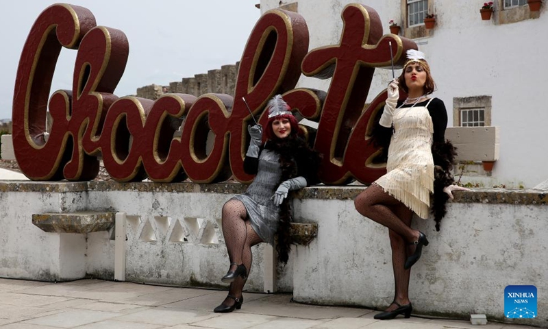 Street artists perform during the 2022 Obidos International Chocolate Festival in Obidos, Portugal, on March 26, 2022.Photo:Xinhua