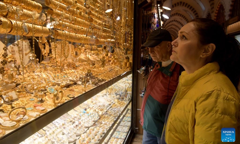 Tourists shop at the Spice Bazaar in Istanbul, Turkey, April 5, 2022. (Xinhua/Shadati)