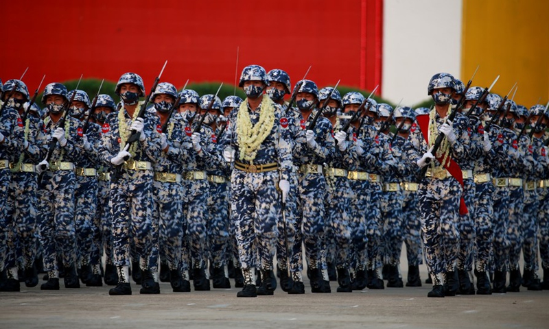 Soldiers march in a formation during a military parade to mark the 77th Armed Forces Day in Nay Pyi Taw, capital of Myanmar, March 27, 2022.Photo:Xinhua
