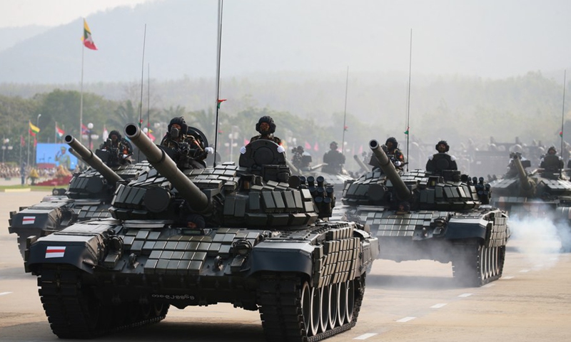 Military vehicles march in a formation during a military parade to mark the 77th Armed Forces Day in Nay Pyi Taw, capital of Myanmar, March 27, 2022.Photo:Xinhua