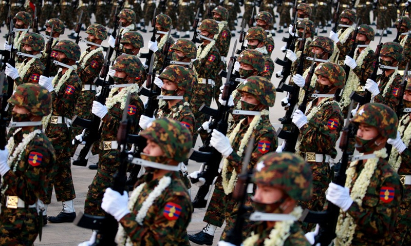 Soldiers march in a formation during a military parade to mark the 77th Armed Forces Day in Nay Pyi Taw, capital of Myanmar, March 27, 2022.Photo:Xinhua