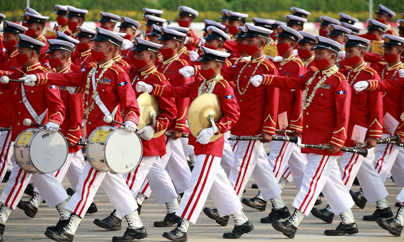 A military band marches in a formation during a military parade to mark the 77th Armed Forces Day in Nay Pyi Taw, capital of Myanmar, March 27, 2022.Photo:Xinhua