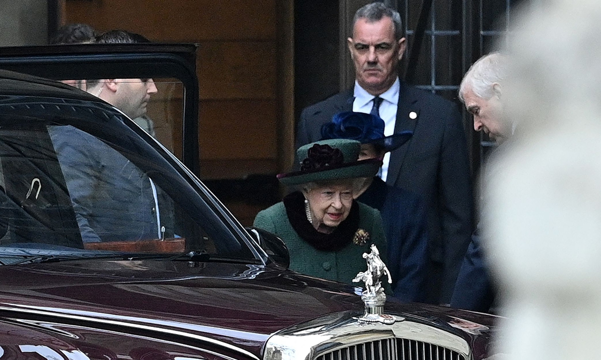 Britain's Queen Elizabeth II (center) and Prince Andrew, Duke of York, (right) leave after attending a Thanksgiving service for Prince Philip, Duke of Edinburgh, at Westminster Abbey in London on March 29, 2022. This is the queen's?first major public event in more than five months after testing positive for COVID-19 in February. Photo: VCG