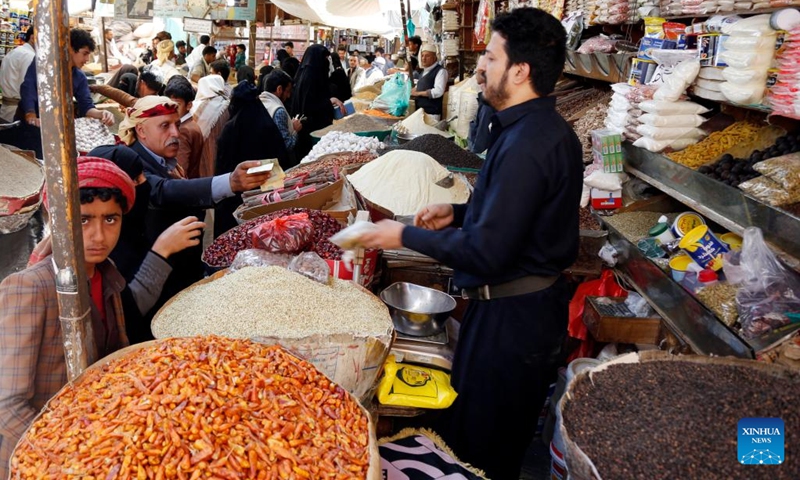 Yemenis shop at a market ahead of the upcoming Ramadan in Sanaa, Yemen, on March 31, 2022. (Photo: Xinhua)