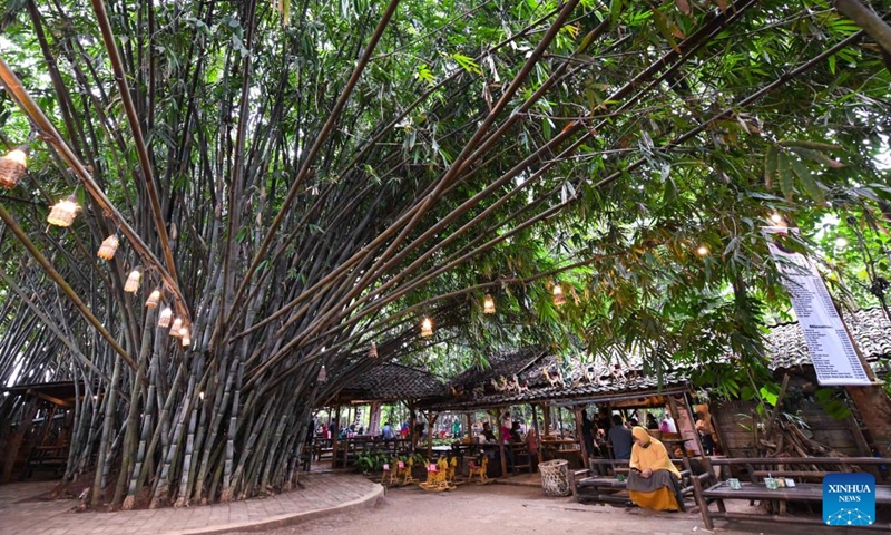 Photo taken on April 1, 2022 shows a view of a restaurant named Warung Tuman in South Tangerang, Indonesia. Located in the woods, this restaurant is locally famous for its Javanese and West Sumatra cuisines. Local people and people from nearby cities such as Jakarta come here to enjoy food in the embrace of nature.Photo:Xinhua