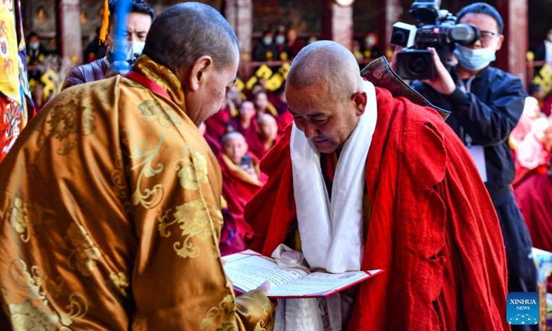 A monk is being awarded the degree of Geshe Lharampa in the Jokhang Temple in Lhasa, capital of southwest China's Tibet Autonomous Region, April 2, 2022.Photo:Xinhua