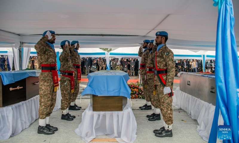 Peacekeepers salute at a memorial service in Goma, the Democratic Republic of the Congo (DRC), on April 2, 2022.Photo:Xinhua