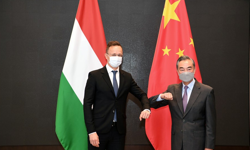 File photo shows Chinese State Councilor and Foreign Minister Wang Yi holding talks with Hungarian Minister of Foreign Affairs and Trade Peter Szijjarto, in Guiyang, capital of southwest China's Guizhou Province, May 31, 2021.(Xinhua)