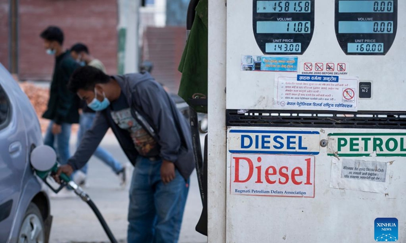 Fuel prices are shown at a gas station in Lalitpur, Nepal, April 6, 2022. Fuel prices in Nepal saw an increase recently.(Photo: Xinhua)