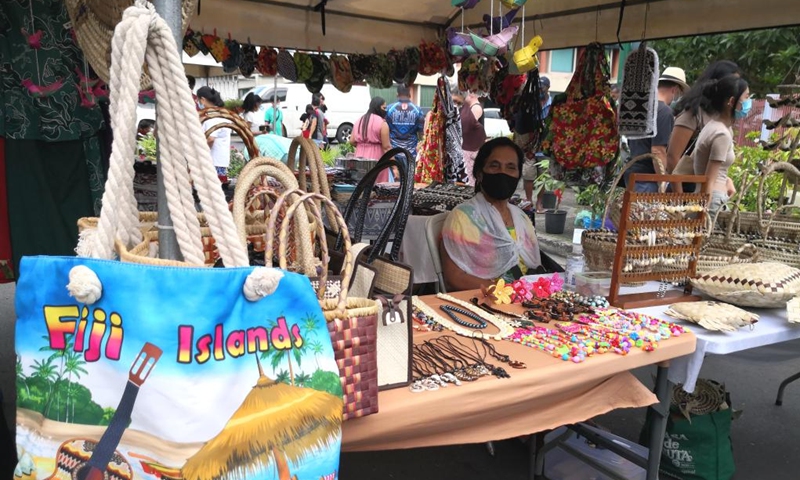 Photo taken on March 20, 2022 shows a handicraft stall at a local market in Suva, Fiji.Photo:Xinhua