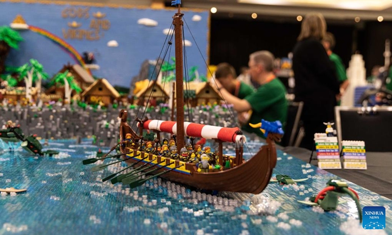 People view LEGO works at the Brick Expo in Canberra, Australia, April 9, 2022. Held in the Hellenic Club of Canberra, the two-day expo showcasing LEGO works attracted many visitors.Photo:Xinhua
