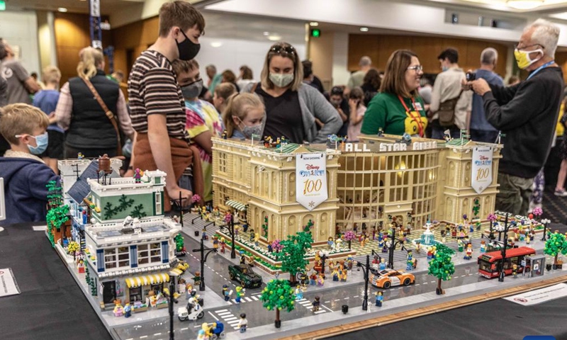 People view LEGO works at the Brick Expo in Canberra, Australia, April 9, 2022. Held in the Hellenic Club of Canberra, the two-day expo showcasing LEGO works attracted many visitors.Photo:Xinhua