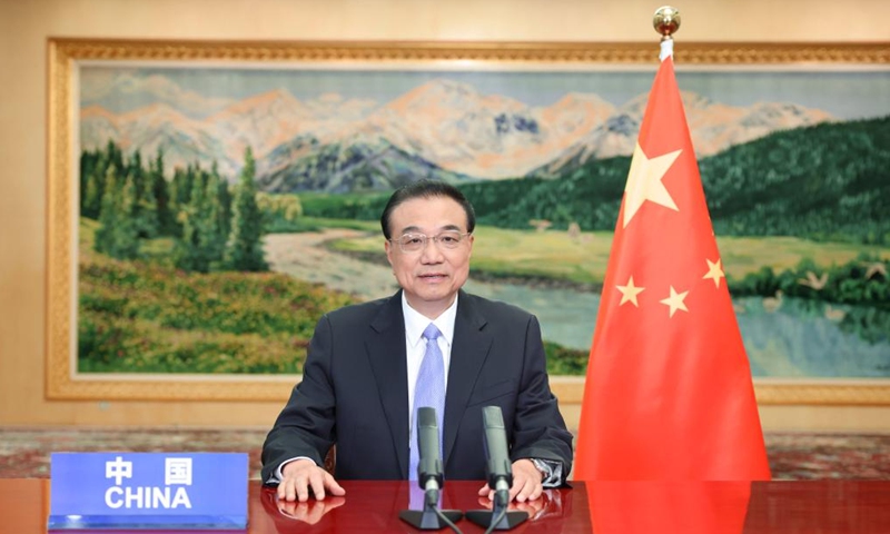Chinese Premier Li Keqiang delivers a speech online while attending the opening ceremony of a special ministerial conference of the Forum for Economic and Trade Cooperation between China and Portuguese-speaking Countries, also known as Forum Macao, in Beijing, capital of China, April 10, 2022. Photo: Xinhua