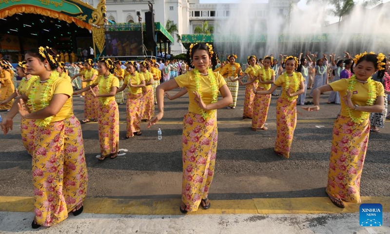Dancers perform during the water festival in Yangon, Myanmar, April 13, 2022. Myanmar's traditional water festival kicked off across the country on Wednesday morning.(Photo: Xinhua)