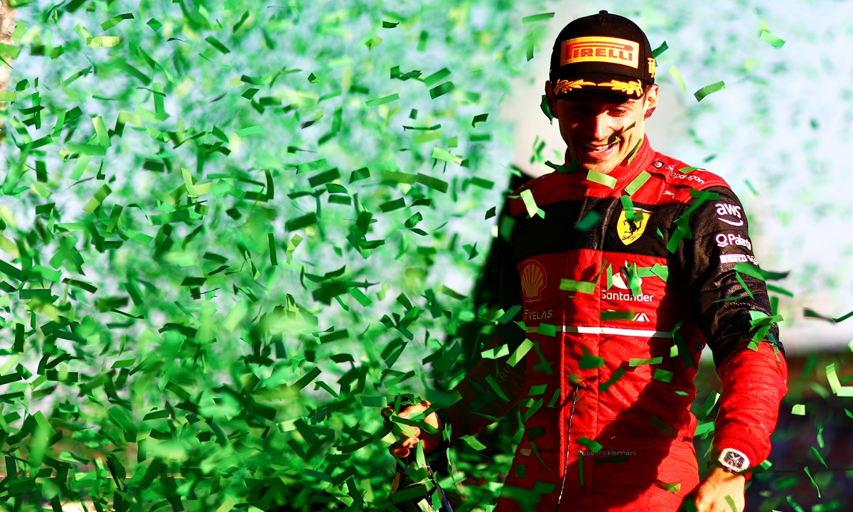 Race winner Charles Leclerc of Monaco and Ferrari celebrates on the podium during the F1 Grand Prix of Australia on April 10, 2022 in Melbourne, Australia. Photo: VCG