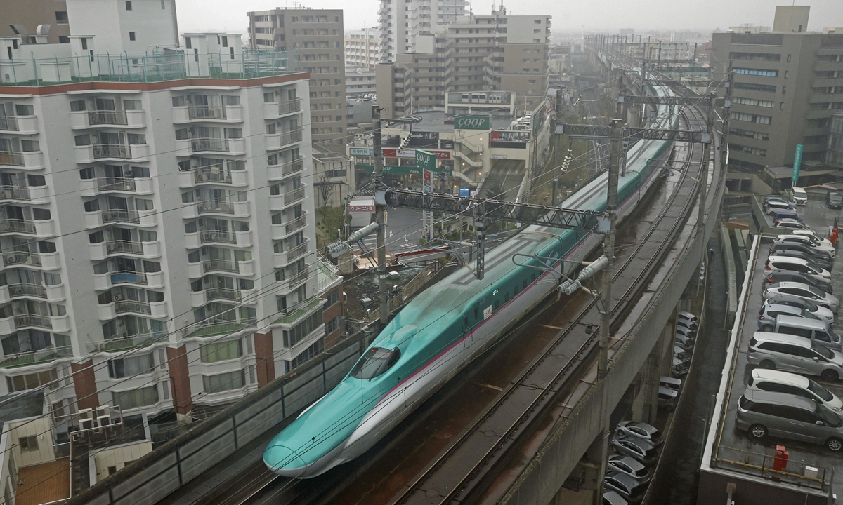 A bullet train heads for Tokyo after departing from JR Sendai Train Station in Sendai, northeast Japan, April 14, 2022.  East Japan Railway Co resumed operations on the entire Tohoku Shinkansen line the same day, nearly a month after a powerful earthquake struck the northeast and derailed one of its bullet trains.  Photo: VCG