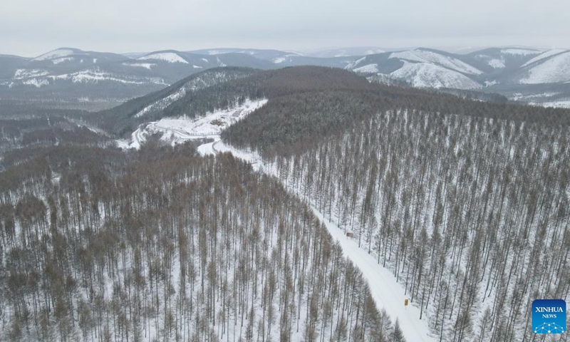 Aerial photo taken on April 14, 2022 shows a view of the snow-covered Saihanba National Forest Park in Chengde City, north China's Hebei Province.(Photo: Xinhua)