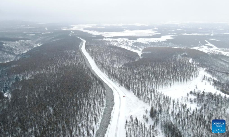 Aerial photo taken on April 14, 2022 shows a view of the snow-covered Saihanba National Forest Park in Chengde City, north China's Hebei Province.(Photo: Xinhua)