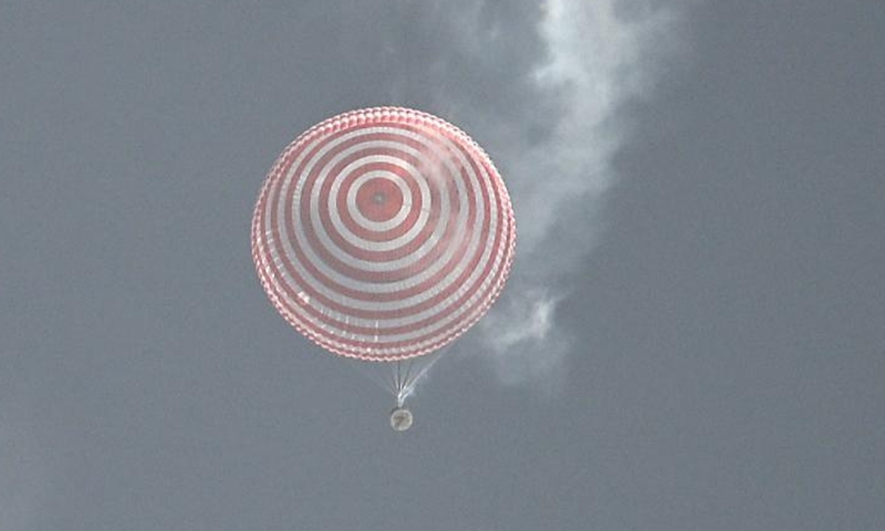 The return capsule of the Shenzhou-13 manned spaceship lands successfully at the Dongfeng landing site in north China's Inner Mongolia Autonomous Region, April 16, 2022.Photo:Xinhua