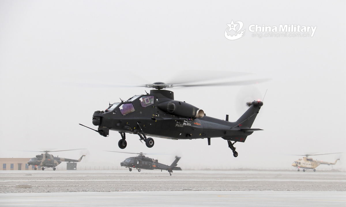 Multiple types of helicopters attached to an army aviation brigade under the PLA 76th Group Army conduct hover checks during a flight training exercise on March 17, 2022. (eng.chinamil.com.cn/Photo by Wu Xiaofeng)