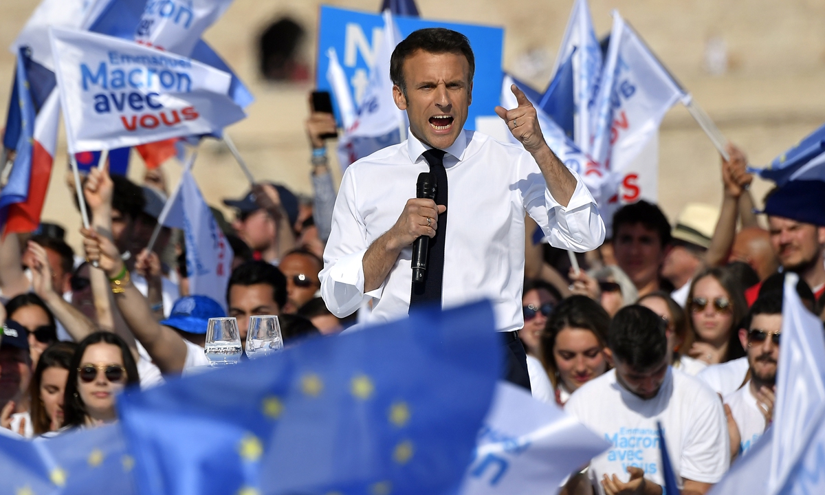 French President Emmanuel Macron adresses voters during a political meeting on April 16, 2022 in Marseille, France. After topping the first vote, Macron and rival candidate Marine Le Pen will face off in the second round of the French presidential elections to be held on April 24.