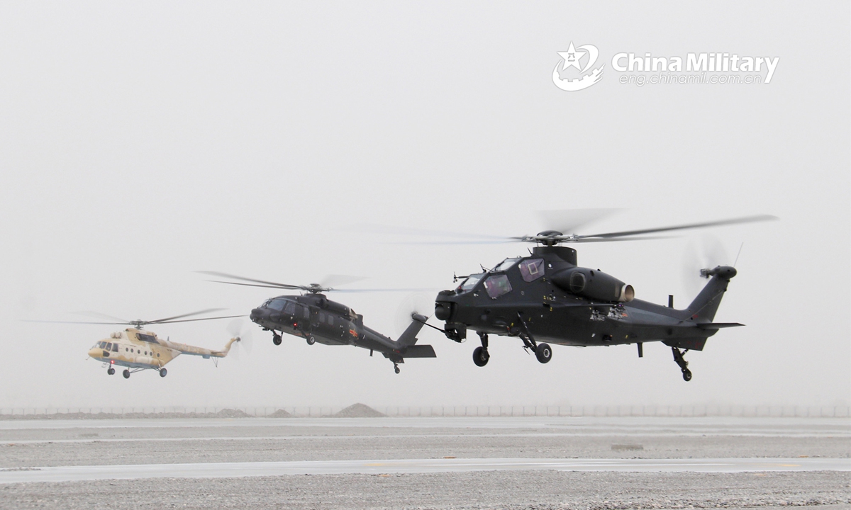 Multiple types of helicopters attached to an army aviation brigade under the PLA 76th Group Army conduct hover checks during a flight training exercise on March 17, 2022. (eng.chinamil.com.cn/Photo by Wu Xiaofeng)