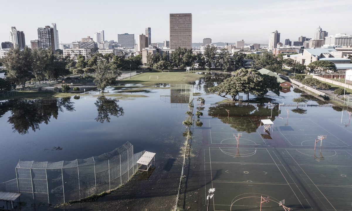 This aerial view shows sports fields under water days after heavy rains in Durban, South Africa on April 15, 2022. Photo: AFP