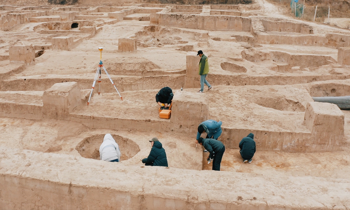 Chinese archaeologists work in the ruins. Photo: Courtesy of Mango TV