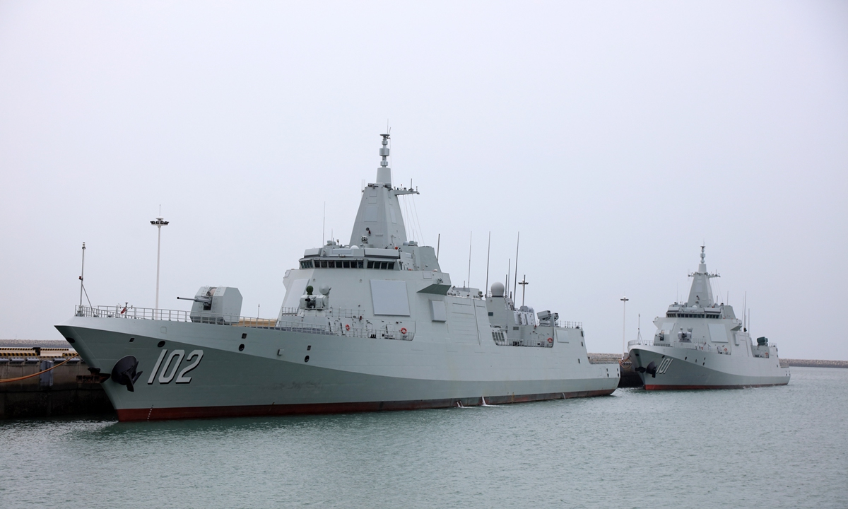 Two Type 055 large destroyers, the <em>Nanchang</em> and the <em>Lhasa</em>, are moored at a naval port in 2021. File photo: Courtesy of the Chinese People's Liberation Army Navy
