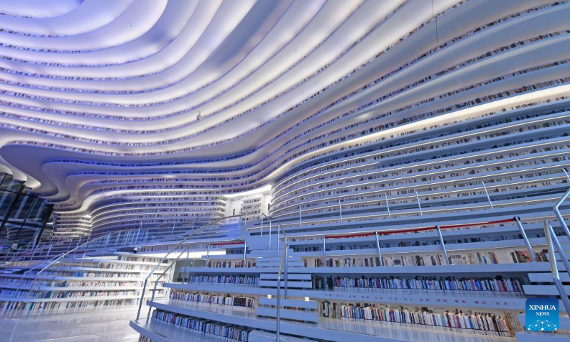 Photo taken on April 20, 2022 shows the interior view of the Tianjin Binhai Library in Tianjin, north China.
The library, a cultural landmark of Tianjin, officially opened to the public in October of 2017. Its stunning design has received a lot of attention from the public. (Xinhua/Zhao Zishuo)