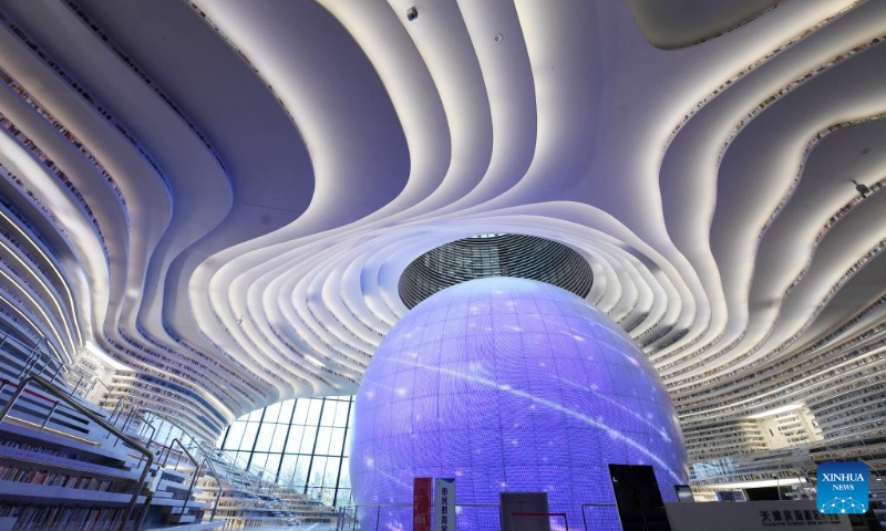 Photo taken on April 20, 2022 shows the interior view of the Tianjin Binhai Library in Tianjin, north China.
The library, a cultural landmark of Tianjin, officially opened to the public in October of 2017. Its stunning design has received a lot of attention from the public. (Xinhua/Zhao Zishuo)