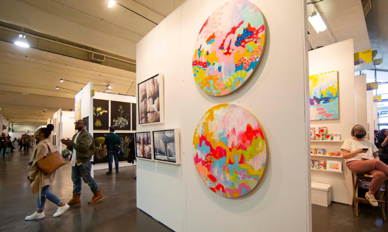 People visit the 2022 Artist Project in Toronto, Canada, on April 21, 2022. Showcasing original artworks by over 200 contemporary artists across Canada, this annual art fair is held from April 21 to 24 this year. (Photo: Xinhua)