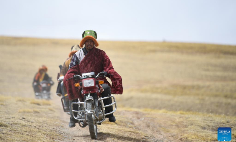 Rangers patrol around Yoigilangleb Qu (river) in Qumalai County of Yushu Tibetan Autonomous Prefecture in northwest China's Qinghai Province, April 21, 2022. Yoigilangleb Qu (river) is located at the core area of Sanjiangyuan National Park. Sanjiangyuan, meaning the 