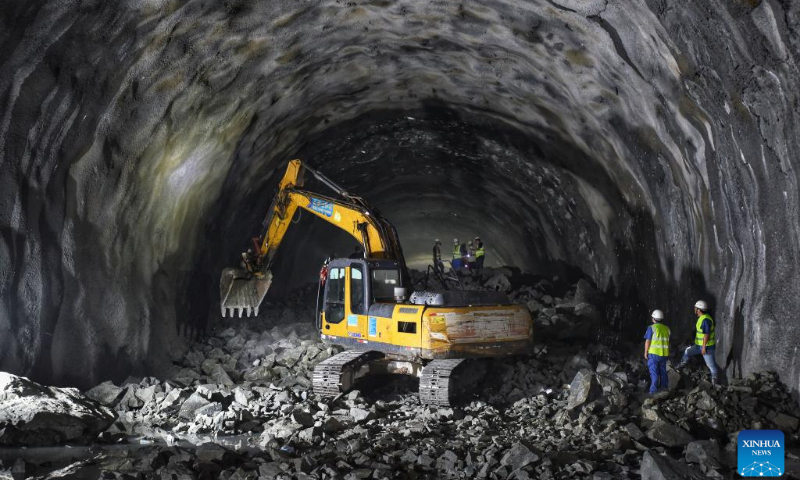 Workers are seen at the construction site of Futoushi Tunnel of Guangzhou-Shanwei Railway in Huidong County of Huizhou, south China's Guangdong Province, April 22, 2022. The Futoushi tunnel of Guangzhou-Shanwei Railway was drilled through on Friday. The 206.2km-long Guangzhou-Shanwei Railway with a maximum speed of 350 km per hour is expected to be put into operation in 2023. (Photo: Xinhua)