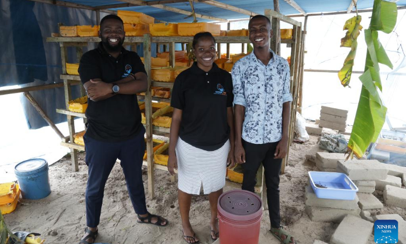 Samaki Farms co-founders pose for a photo at their workshop in Dar es Salaam, Tanzania, on April 21, 2022. Six young aquatic and fisheries science graduates from Tanzania's leading state-run university have joined hands to save fish farmers from the headache of finding suitable fish feeds. (Photo: Xinhua)