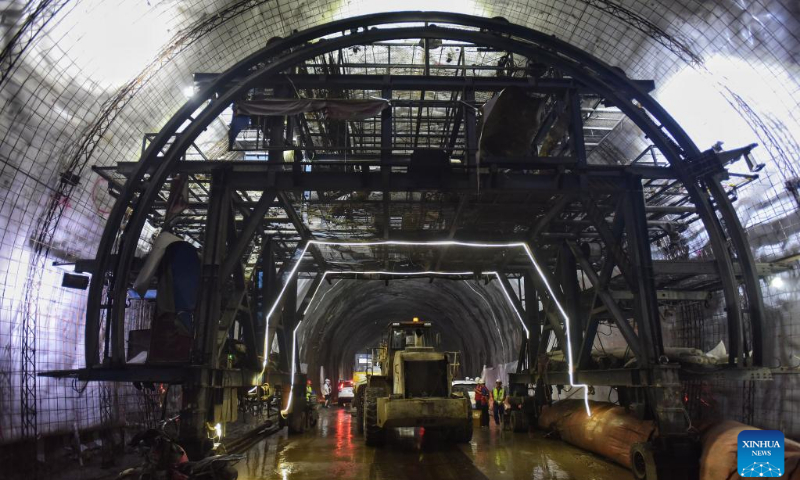 Construction vehicles enter the Futoushi Tunnel of Guangzhou-Shanwei Railway in Huidong County of Huizhou, south China's Guangdong Province, April 22, 2022. The Futoushi tunnel of Guangzhou-Shanwei Railway was drilled through on Friday. The 206.2km-long Guangzhou-Shanwei Railway with a maximum speed of 350 km per hour is expected to be put into operation in 2023. (Photo: Xinhua)