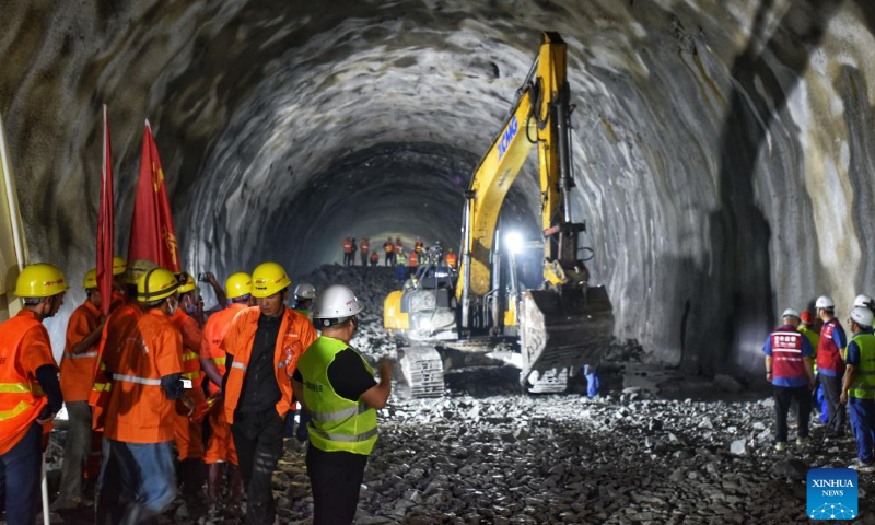 Workers are seen at the construction site of Futoushi Tunnel of Guangzhou-Shanwei Railway in Huidong County of Huizhou, south China's Guangdong Province, April 22, 2022. The Futoushi tunnel of Guangzhou-Shanwei Railway was drilled through on Friday. The 206.2km-long Guangzhou-Shanwei Railway with a maximum speed of 350 km per hour is expected to be put into operation in 2023. (Photo: Xinhua)