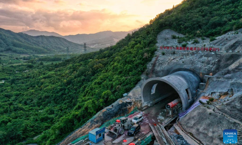 Aerial photo shows an exit of Futoushi Tunnel of Guangzhou-Shanwei Railway in Huidong County of Huizhou, south China's Guangdong Province, April 22, 2022. The Futoushi tunnel of Guangzhou-Shanwei Railway was drilled through on Friday. The 206.2km-long Guangzhou-Shanwei Railway with a maximum speed of 350 km per hour is expected to be put into operation in 2023. (Photo: Xinhua)