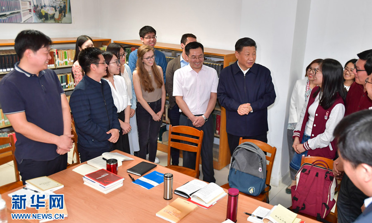 President Xi Jinping joins a group of Chinese and foreign students at the School of Marxism of Peking University (PKU) in Beijing on May 2, 2018. Photo: Xinhua