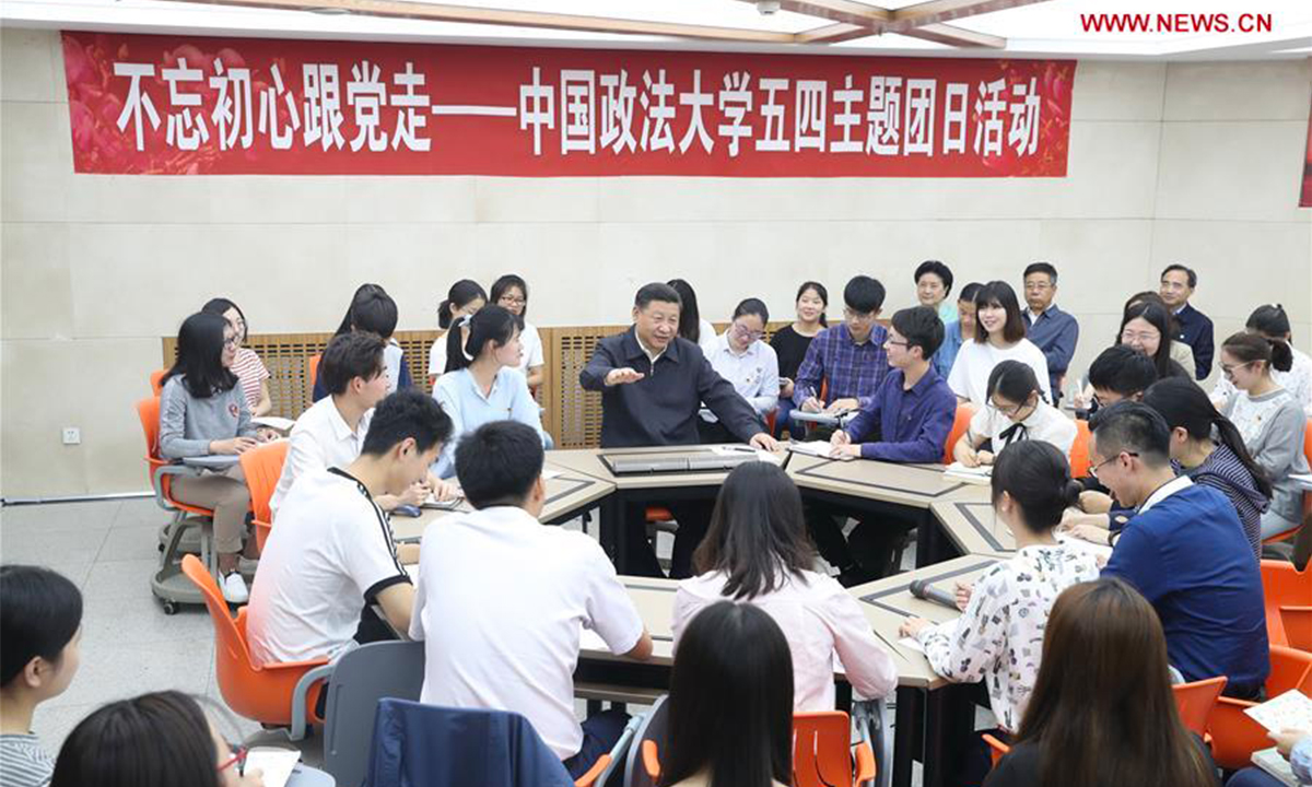President Xi Jinping attends a session of youth league activity with students of Civil, Commercial and Economic Law School while inspecting China University of Political Science and Law in Beijing on May 3, 2017. Photo: Xinhua