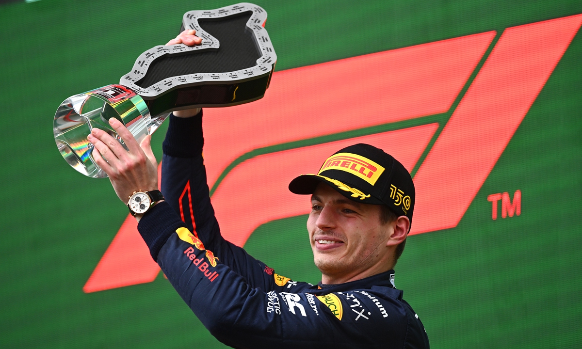 Race winner Max Verstappen celebrates on the podium on April 24, 2022 in Imola, Italy. Photo: VCG