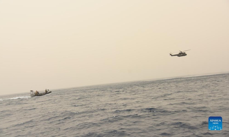 Lebanese military ship and helicopter search for bodies at sea in Tripoli, Lebanon, on April 24, 2022.Photo:Xinhua