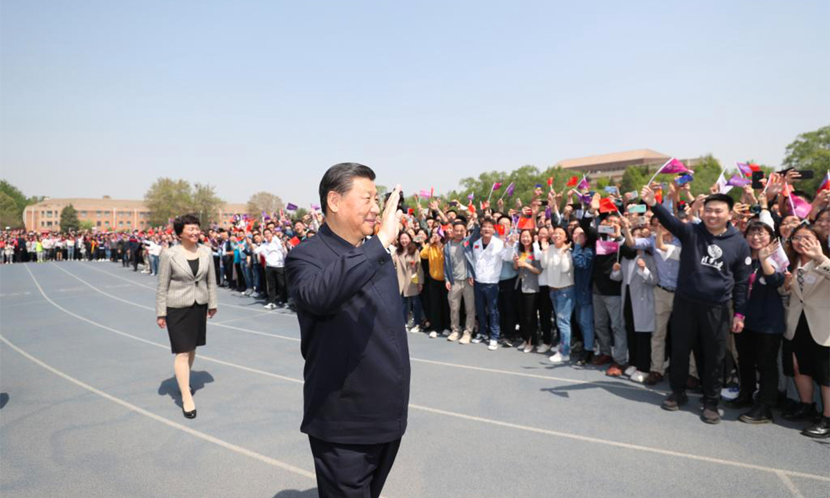 President Xi Jinping waves to faculty members and students before he leaves Tsinghua University in Beijing on April 19, 2021. Xi visited Tsinghua University ahead of its 110th anniversary. Photo: Xinhua