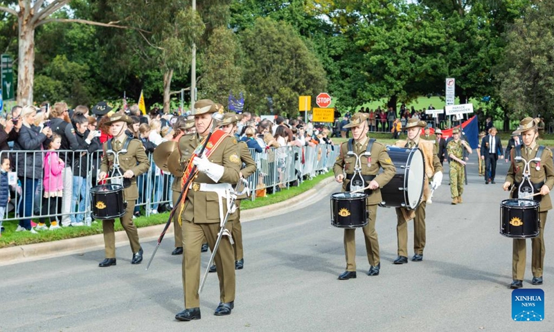 People attend an event marking the Anzac Day in Canberra, Australia, April 25, 2022. Anzac Day, held on every April 25, dates back to a pivotal World War I campaign in 1915 fought by the Australian and New Zealand Army Corp on the shores of Turkey's Gallipoli peninsula.(Photo: Xinhua)