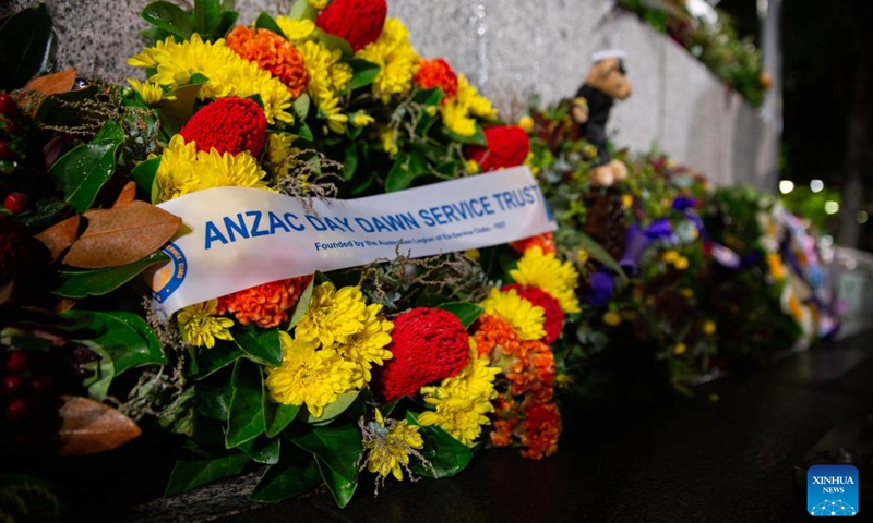Wreaths are seen at the Anzac Day dawn service in Sydney, Australia, on April 25, 2022. Anzac Day, held on every April 25, dates back to a pivotal World War I campaign in 1915 fought by the Australian and New Zealand Army Corp on the shores of Turkey's Gallipoli peninsula.(Photo: Xinhua)