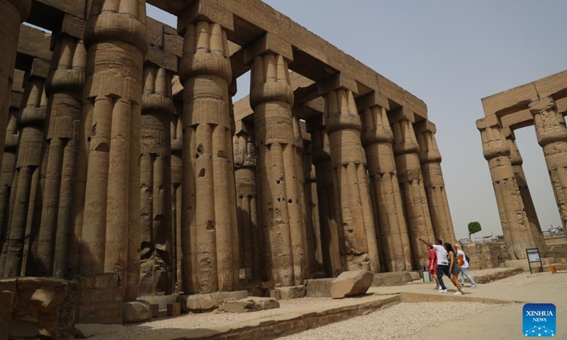 Tourists visit the Luxor Temple in Luxor, Egypt, on April 26, 2022. Luxor, a capital of ancient Upper Egypt known as Thebes, is nowadays a famous tourist destination for the historic temple buildings and other relics.(Photo: Xinhua)