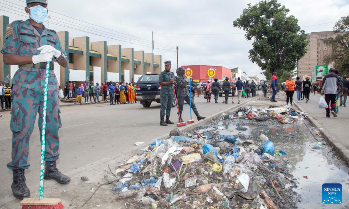 Soldiers take part in a cleaning activity on the Kaunda Day in Lusaka, Zambia, on April 28, 2022. Zambians on Thursday marked the inaugural Kaunda Day in honor of the country's founding leader Kenneth Kaunda with a call to promote the value of unity that he espoused.Photo:Xinhua