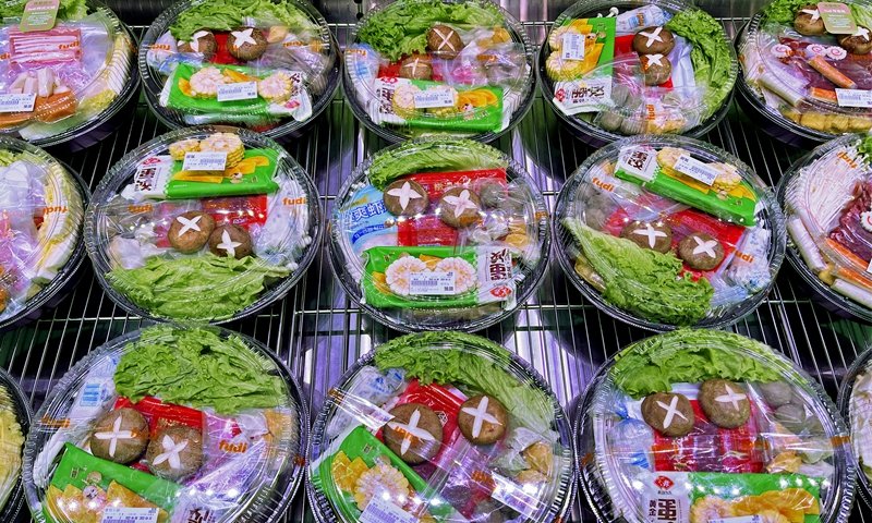 Prepackaged foods in a supermarket in Beijing, on April 9, 2022. Photo: VCG