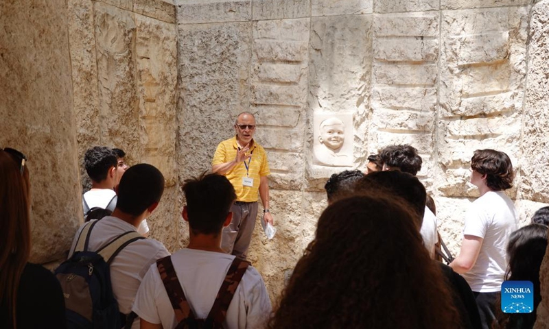 People visit Yad Vashem, the World Holocaust Remembrance Center, in Jerusalem on April 26, 2022. Israel's national annual Holocaust remembrance day will be marked on Wednesday and Thursday, in remembering the 6 million Jews who perished in the Holocaust during the Second World War. (Xinhua/Wang Zhuolun)
